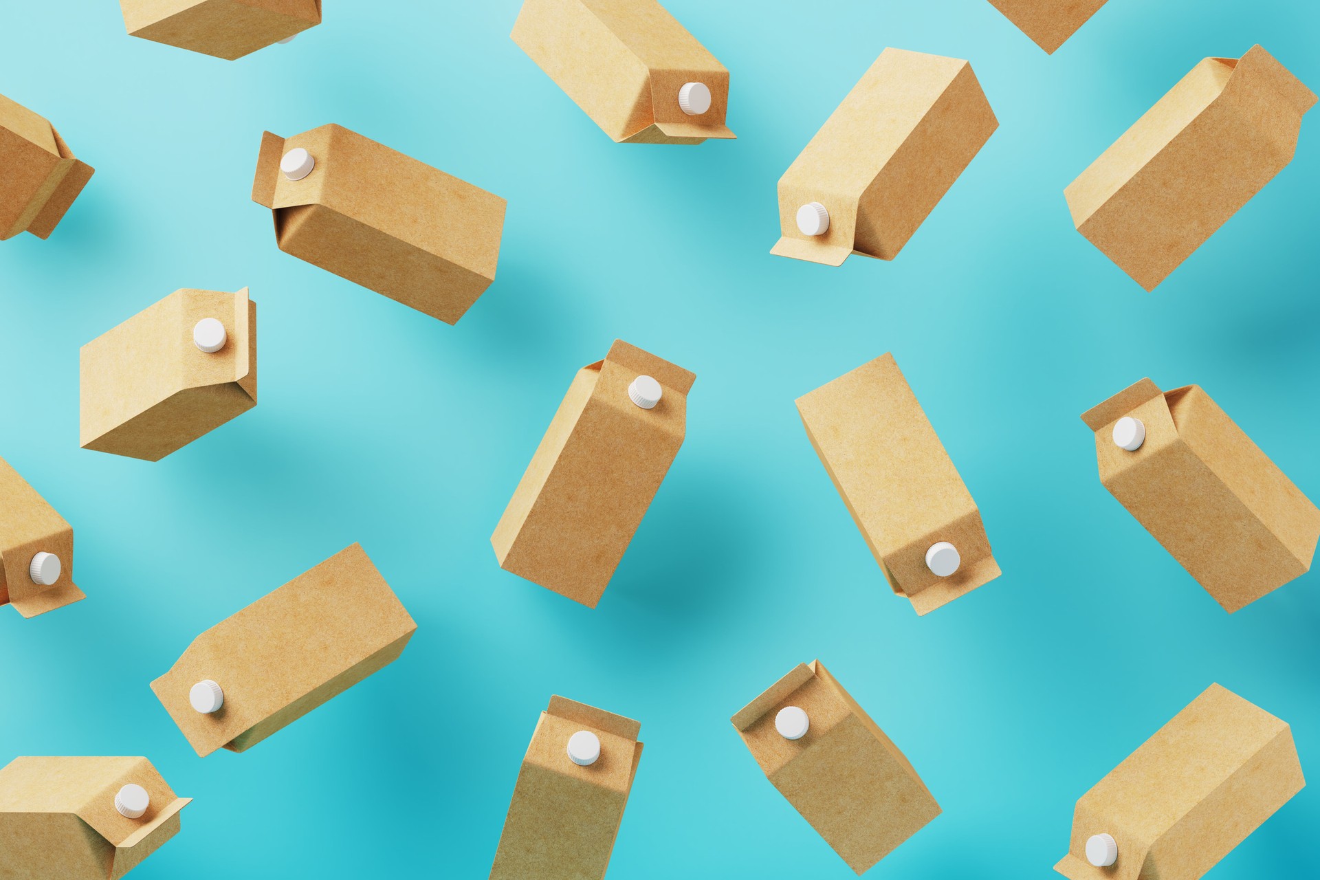Milk Boxes Made Of Recycled Paper On Blue Background